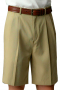 Custom-made tan casual pleated men's shorts made of soft wool for everyday comfort including a zipper fly and hand tailored easy to reach on-seam pockets.