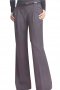 This custom-made womens flare leg pants with a high waist displays vertical front pockets, reverse double pleats and dropped extended belt loops. With hand sewn cuffs and hems, this semi-casual grey womens pants is perfect for all day comfort. Customize it in wool, silk or cotton.