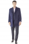 This custom overcoat makes an elegant, easily adaptable addition to any seasonal ensemble. Tailored with a comfortable slim fit, this three button piece features flap pockets, a soft shoulder, and notched lapels.
