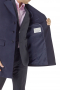 This custom overcoat makes an elegant, easily adaptable addition to any seasonal ensemble. Tailored with a comfortable slim fit, this three button piece features flap pockets, a soft shoulder, and notched lapels.