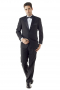 Traditional comfortable custom tailored Black tuxedo with peak satin lapel and plain front pants, worn with a crisp white shirt, black bow tie, and white pocket square.