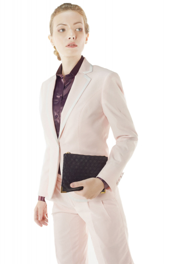 Striking light cream pant suits with stunning slim jackets and stylish custom pants. Jackets lay out double piped lower pockets, notch lapels with satin finish collars and one front button to close. Slim pants incorporate reverse double pleats, front slash pockets and buttoned waistband with front zip to close.