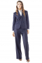 Stunning bootcut custom pants with flare legs and flat fronts, putting to view zipper fly and extended waistband with hooks to close. Sexy two button jackets with two flapped lower pockets flashing notch lapels and front and back princess darts. You can order these regal navy blue pant suits in wool and or cashmere.