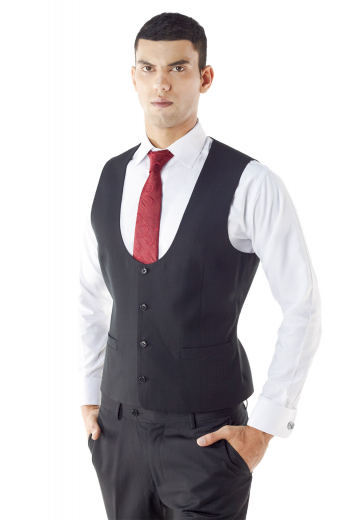 Whether it's over a shirt and tie or under a jacket, this sharp custom made traditional U-neck waistcoat will add a bold layer of style to any look. Cut with a slim fit, this tailor made waistcoat is expertly tailored with great features like handmade welted pockets, medium gorge, rear adjustment strap, and made to measure 4-Buttons closure.

