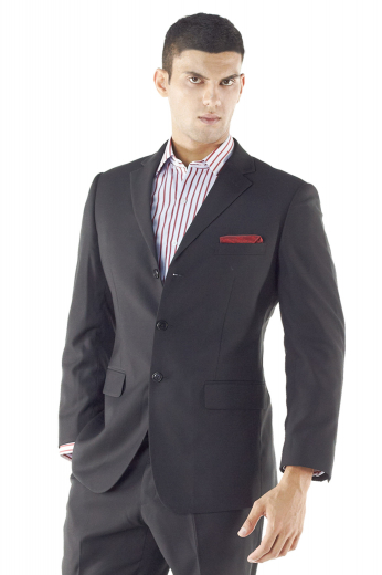 A custom made single-breasted slim cut two-button suit jacket with tailored slim ruled notch lapels, a handmade boutonniere, hand molded shoulders and a made to measure center vent.