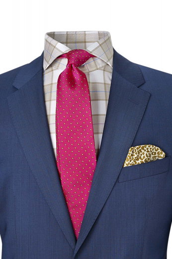 A hand-tailored slim cut single-breasted cadet blue two-button blazer, elegantly made with made to order notch lapels, a boutonniere, a custom made upper welt pocket, and a made to measure center vent.