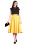 Handmade with silk, these calf length feminine bespoke skirts are semi-formal party wears. These tailor made mustard yellow flared skirts display made to order concealed zipper at front left and tailored extended waistband with belt loops for proper closure.