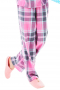Bespoke plaid pajamas displaying handmade loose fit pants flashing zipper fly for front closure and elastic waistband, and made to order loose casual shirts with tailored matching front closure buttons and tailor made squared bottoms. These cotton pajamas can be made wrinkle proof as well.