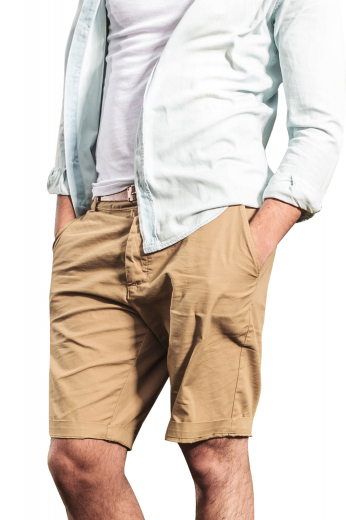 Style no.15889 - These mens made to order khaki golf shorts in cotton are perfect for men who like style as much as comfort. These mens custom made low rise shorts have a flat front and a zipper fly. With comfortable belt loops, 2 front slash pockets, and 2 back pockets, these mens handmade slim fit khaki shorts also feature 2 1.5 inch wide turned-up cuffs. You can buy these mens bespoke cotton summer shorts at My Custom Tailor to sport a casual look. 