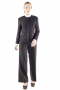 This super trendy womens handmade black tuxedo suit in wool - featuring a tailor made slim fit jacket and custom made baggy pants - gives a never-seen-before kind of formal look. The womens tailor made suit pants have a flat front, 2 on-seam front pockets, 2 beautifully hand sewn cuffs hems at the bottom, a zipper fly, and a 2 point button and hook closure. The womens bespoke tuxedo jacket is a show stealer with a princess dart front and back, 2 lower welt pockets, a rounded collar, and 5 front close buttons.