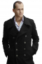 This mens made to order cashmere wool black overcoat is an ideal winter retreat for men who like to stay stylish all the time. This mens custom made double breasted overcoat with 8 front buttons and 3 to close features a stunning duckbill collar. With 1 boutonniere on the left lapel, elegant hand moulded shoulders, and 2 slanted welted lower pockets, this mens bespoke black wool overcoat can be purchased at My custom Tailor at unbelievably low rates.