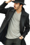 This trendy mens handmade black overcoat in cashmere wool has a comfortable fitting. With a double breasted pattern, this mens bespoke wool overcoat features 6 front buttons with 3 to close, 2 3Â½-inch-wide edge stitched notch lapels with a boutonniere on the left lapel, and 2 slanted edge stitched lower pockets. You can buy this mens made to order double breasted overcoat at My Custom Tailor and wear it to all formal events and corporate parties.
