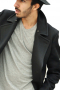 This trendy mens handmade black overcoat in cashmere wool has a comfortable fitting. With a double breasted pattern, this mens bespoke wool overcoat features 6 front buttons with 3 to close, 2 3Â½-inch-wide edge stitched notch lapels with a boutonniere on the left lapel, and 2 slanted edge stitched lower pockets. You can buy this mens made to order double breasted overcoat at My Custom Tailor and wear it to all formal events and corporate parties.