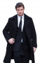 This super stunning mens tailor made black overcoat in 180s wool displays a calf length. With a trendy single breasted pattern and 3 front close buttons, this mens handmade black overcoat also features 4 stunning 1/2 inch lapels with 1 boutonniere on the left lapel, 2 slanted lower pockets, and stylish buttoned epaulettes on both the cuffs. Customised for ultimate comfort by the weavers at My Custom Tailor, the edges of the lapels and pockets are hand stitched. 