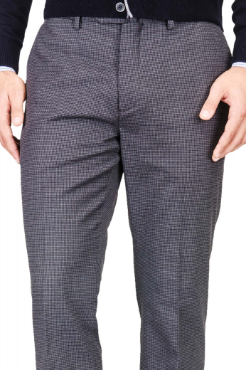 These exquisitely hand stitched mens bespoke dark grey plaid formal pants in 120s wool are spectacular formals for office and corporate events. With extended belt loops and a 2 point button and hook closure, these mens bespoke slim fit wool pants have 2 on seam front pockets and 2 intricately hand sewn back pockets with a double piped button through the pockets on both sides. These mens tailor made slim fit formal dress pants can be purchased at My Custom Tailor at affordable rates. 