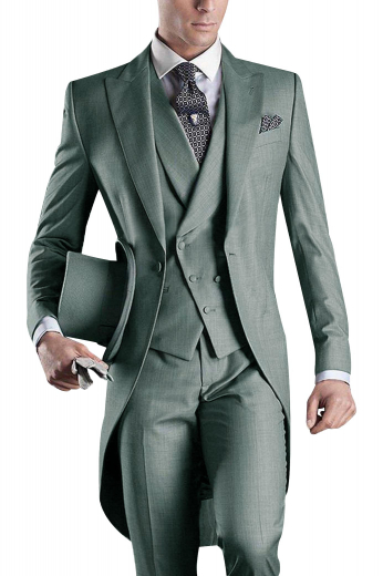 This mens handmade grey tailed tuxedo suit in wool features a bespoke double breasted vest, tuxedo pants, and a handmade slim fit jacket. The mens tailor made tail jacket features peak lapels with 1 boutonniere on the left lapel and 1 upper welt pocket. The mens custom made slim fit vest has a shawl collar, a cloth back with an adjustable buckle, 2 lower welted pockets, and 5 front buttons, 3 to close. And, the mens made to order slim fit dress pants have a 2 point button and hook closure, a zip fly, and 2 front slash pockets.