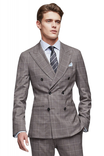 Iconic handmade double breasted cashmere wool plaid suit for men with a handmade slim fit jacket and bespoke suit pants. The mens tailor made suit pants feature a zipper fly, extended belt loops to support a 2 point button and hook closure, and 2 front slash pockets and 2 back pockets. The mens bespoke plaid jacket has a slim cut fitting designed to flaunt 2 slim ruled peak lapels, 2 lower flapped pockets, and 1 upper welt pocket. Buy this mens custom made wool suit to slay in style at work and corporate meetings.