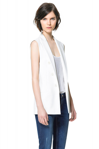Classy womens handmade cotton vest in ivory. A perfect formal that you can wear to interviews and meetings. This tailor made cotton vest for women has a slim cut fitting further boosted with the inclusion of a cloth back with an adjustable buckle so that you can drape this womens slim fit vest around your waist as tightly as you want. This womens bespoke vest with a hand sewn peak lapel collar also features 6 front buttons. Take a bite at luxury with the inclusion of this stunner in your summer wardrobe of corporate wear.