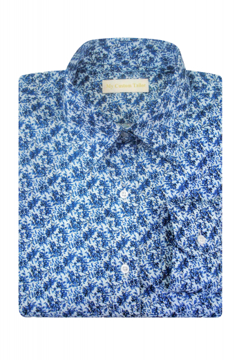 This jaw dropping womens handmade floral blouse in blue is a visual delight. You can wear it at all formal events and interviews. This womens custom made slim fit blouse features a beautifully hand stitched Ainsley collar with 2 attractive 1/2 inch collar points. This stunningly stylish womens bespoke cotton dress shirt with a placket front and plain back also has 2 hand sewn rounded barrel cuffs for extra oomph. Buy it at My Custom Tailor to be a trendsetter at work.