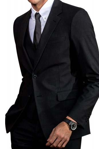 This iconic handmade black 3 piece wool suit for men features a flat front mens bespoke pant, a mens slim cut vest, and a mens custom blazer. The slim fit mens bespoke pant features a two point button and hook closure, slash pockets, and zip fly. The mens bespoke vest has a 5 button front closure and a V neck. The mens custom black suit jacket is woven to display a slim fit cut with 2 front close buttons, 2 lower flap pockets, and 1 upper welt pocket. Order online at My Custom Tailor to buy this stellar mens bespoke black suit.