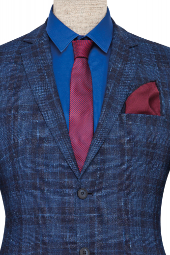 This men's blue and black plaid custom blazer is perfect for all formal occasions! It is tailor made in a fine wool and cut to a slim fit, featuring single breasted button closure and notch lapels.