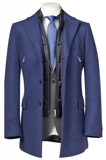 This men's dark blue coat is tailor made in a fine wool and tweed and cut to a slim fit, featuring a single breasted button closure and edge stitched pockets. It is a fashionable winter coat, sure to become a favorite in your winter wardrobe!