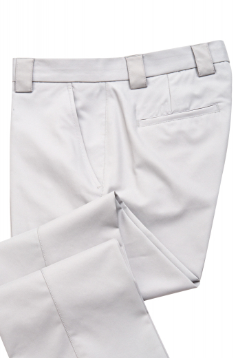 Style no.16563 - This men's sleek white pant is tailor made in a fine wool blend and cut to a slim fit, featuring front slash pockets, extended belt loops, and a flat front pleat. 