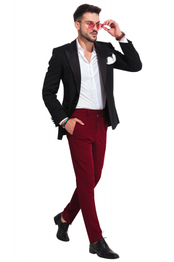 This men's bold red pant is tailor made in a fine wool blend and cut to a slim fit, featuring slash pockets, extended belt loops, and a flat front pleat. They are a stylish option for any office or special occasion.