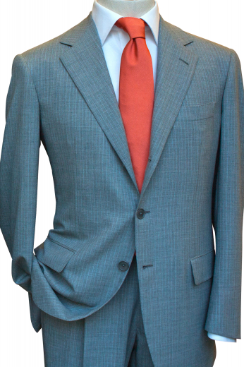 Style no.16750 - This sleek men's pant suit is tailor made in a fine wool blend and cut in a slim fit, featuring notch lapels, single breasted button closures, and slash pockets.