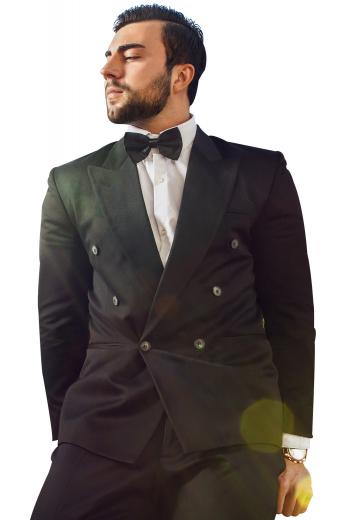 This sleek men's pant suit is tailor made in a fine wool blend and cut in a slim fit, featuring  double breasted button closures and slash pockets.