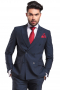 This men's pant suit is tailor made in a fine wool blend, featuring a double breasted button closure, peak lapels, and handsewn cuffs. 