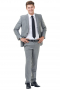 This tailor made pant suit is custom made in a fine wool blend and features a single breasted button closure, notch lapels, and handstitched pockets. 