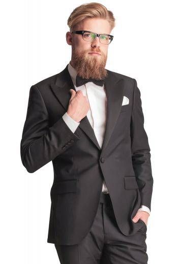 Style no.16810 - This brown men's suit is tailor made in a fine wool blend, featuring a single breasted button closure and peak lapels, perfect for all formal occasions. 