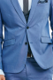 This men's pant  suit is tailor made in a fine wool blend and cut to a slim fit, featuring single breasted button closures, notch lapels and slash pockets. It is perfect for all formal occasions, in a pastel blue color. 