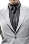 Custom Made Single Breasted Two Button Slim Fit Suit featuring Wide Peak Lapels, Flap front Pockets with Flat front Pants, Slash Pockets for a modern look 