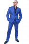 This blue textured pant suit is a bold option for any formal occasion. It features a single breasted button closure and notch lapels, and is custom made in a wool blend.