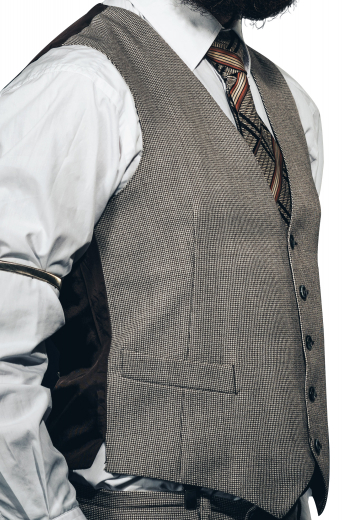 A classic tailored men's grey custom tailored vest is tailor made in a wool blend, featuring a single breasted five button closure and welted lower pockets, perfect for any formal occasion. 