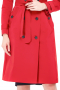 This women's outer coat is tailor made in a wool blend. It is made to measure to ensure a perfect fit, featuring a double breasted closure, hand stitched lapels, and a detached belt. 