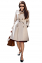 You are sure to love this beautiful women's over coat is tailor made in a fine wool blend featuring a double breasted button closure and landing just above the knee.