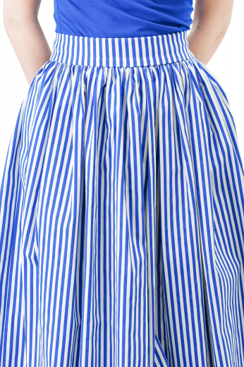 Women's knee length pleated skirt in a beautiful pinstripe design. This retro-inspired piece is made to measure with a beautiful wool blend, with a concealed zipper. 
