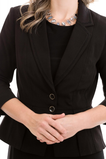 This modern black skirt suit will instantly elevate your office look and have you feeling incredibly confident. It is custom made with a single breasted blazer closure and a knee length skirt. 
