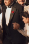 In a sleek and stylish classic black is this men's single breasted wedding tuxedo with wide notch lapels that flatter the figure. This vintage classic tuxedo can be custom tailored to fit you right for the special occasion. 