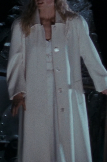 Tailored movie costume coats for sale from the famous Hollywood film Batman, including this custom made women’s long white coat featuring stylish designs from the late 90s and early 2000s. This women’s coat is a great Batman cosplay costume for woman.