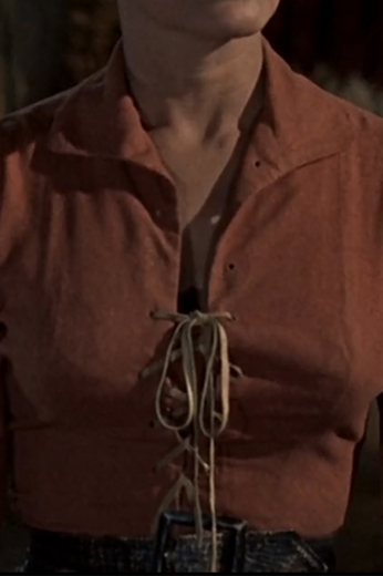 Style no.20285 - Any vintage fashion film fan will love this El Dorado blouse in a sienna tan orange just as worn in the hit film. This women’s movie blouse is a great buy not just for cosplay events but also for casual wear.