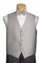 A men's single breasted five button v-neck vest tailor-made to pair with an elegant tuxedo shirt. This dress vest made for a custom elegant suit on a classy man.