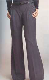 This custom-made womens flare leg pants with a high waist displays vertical front pockets, reverse double pleats and dropped extended belt loops. With hand sewn cuffs and hems, this semi-casual grey womens pants is perfect for all day comfort. Customize it in wool, silk or cotton.