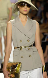Dazzle in style with these V neck overcoats boasting a peak lapel collar. These semi-formal sleeveless outerwears put to show six contrast front buttons, three to close. Its buttoned lower pockets with impressive patch work display V shaped flaps. Squared bottom and double breasted, these wrinkle proof gray outerwears can be customized in wool and or silk.