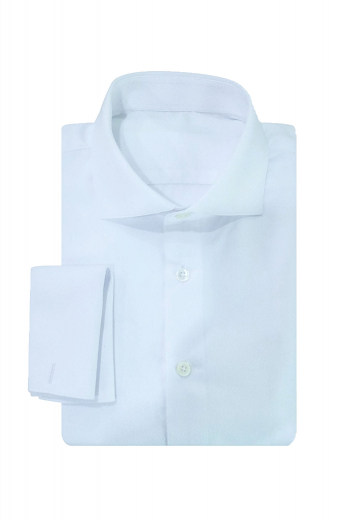 This stellar mens made to order blue formal dress shirt in Egyptian cotton features a stunning full spread collar with 3 inch wide collar points. With a collar height of 1 1/4 inch, this mens tailor made slim fit business shirt also features standard tails, a plain back and plain front, and 2 artistically sewn squared edge french cuffs. You can buy this mens tailor made Egyptian cotton blue dress shirt at My Custom Tailor to upgrade your wardrobe of iconic handmade office garments for a stunning work look.