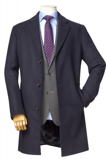 Mens Black Classic Single Breasted Tailored Coat This men's black coat is a handsome fit for your winter needs! It is tailor made in a fine wool and tweed and cut to a slim fit, featuring a single breasted button closure and edge stitched lapels.