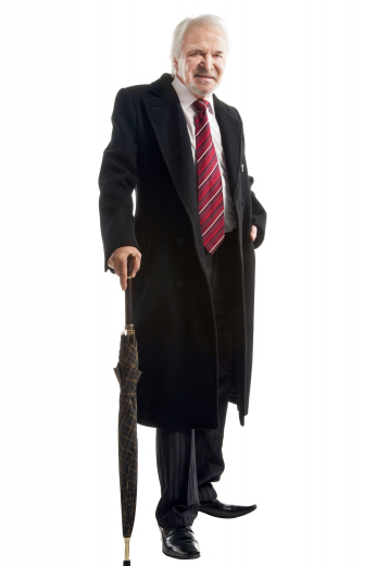 Mens Long Black Tailored Classic Coat This men's black coat is tailor made in a fine wool and tweed and cut to a slim fit, featuring a double breasted button closure, slanted welt pockets and edge stitched lapels. It is a sleek coat, sure to become a favorite in your winter wardrobe!